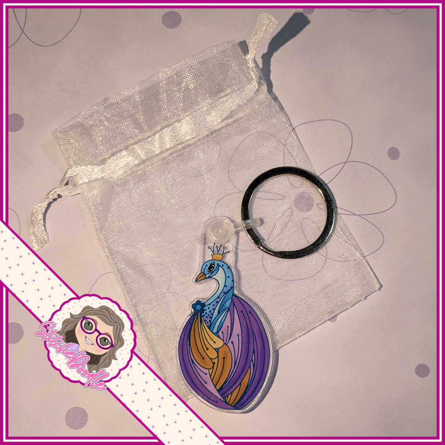 Peacock Keyring. Vibrant, elegant artwork.