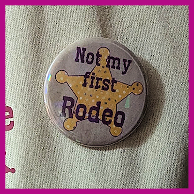 Tote Bag with Coordinating Badge. Bootin' up the day with style and sass.