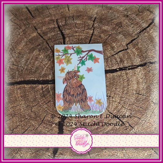 Highland Hamish in Autumn Leaves Magnetic Bookmark.