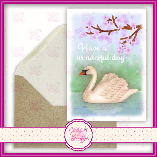 Swan lake with lilac blossom tree. 'Have a beautiful day'.  A6 Greeting Card and Envelope.